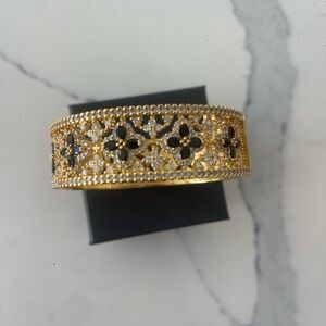 Elegant Gold and Black Floral Bracelet